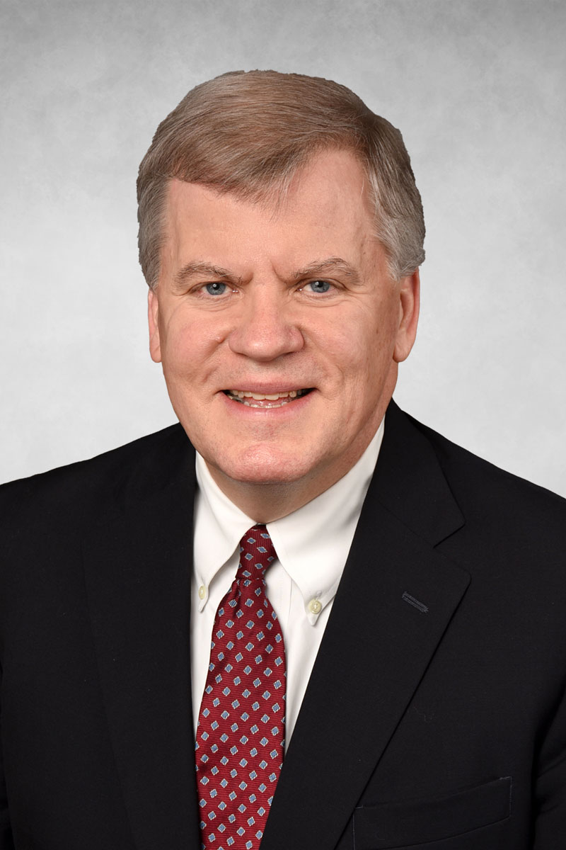 John D. Luken headshot.