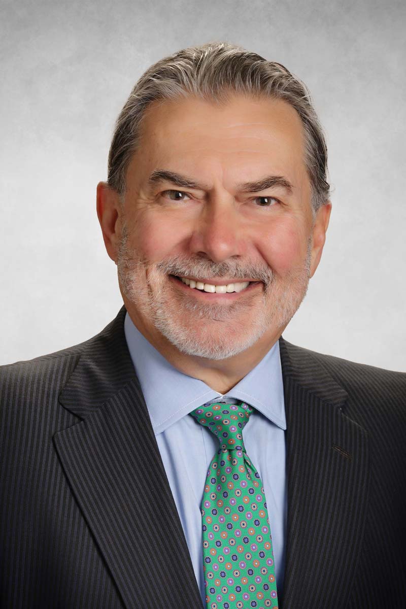 John E. Selent headshot.