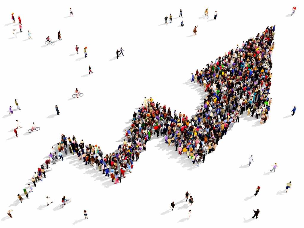 Crowd of people forming an upward arrow symbolizing growth, success and progress